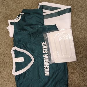 Michigan state jersey and football pants
